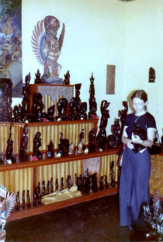 Jane viewing wood carvings at Mas