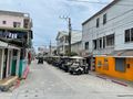 Street scene in Belize City. Note all the golf carts.