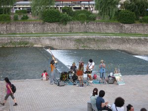 Impromptu concert by the canal in Kyoto