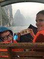 Sue and Liam with the RMB20 note & mountains