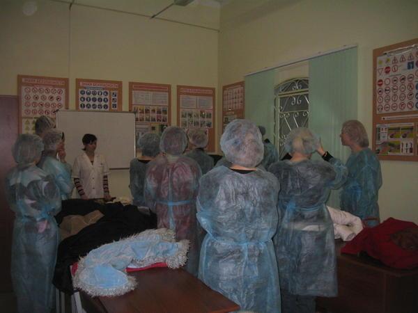 Putting on our dresses for the trip around the bread factory.