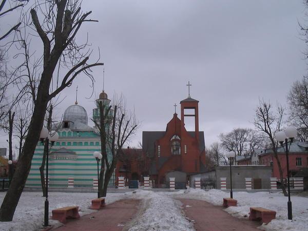 The mosque and the church in the daytime.