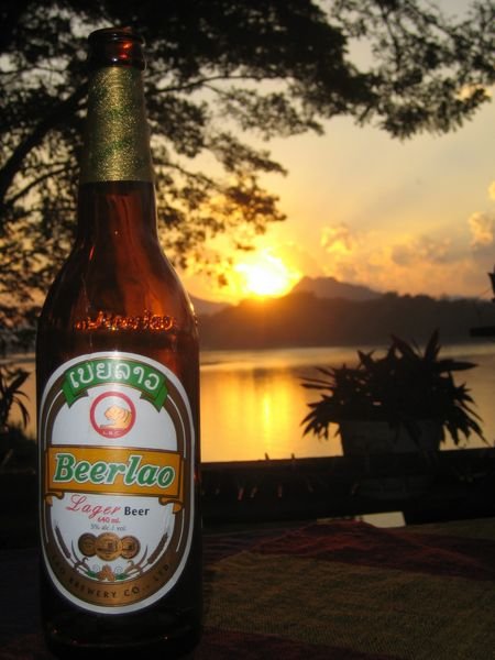 The Mighty Mekong Sunset with a Beer Lao in the Foreground