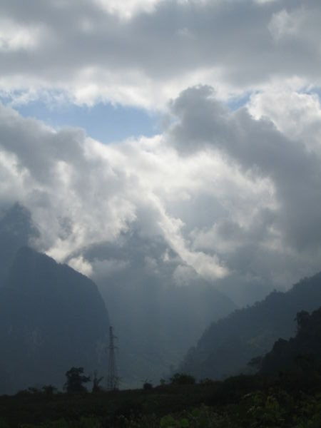 Motobiking Through Vang Vieng Peak Clouds