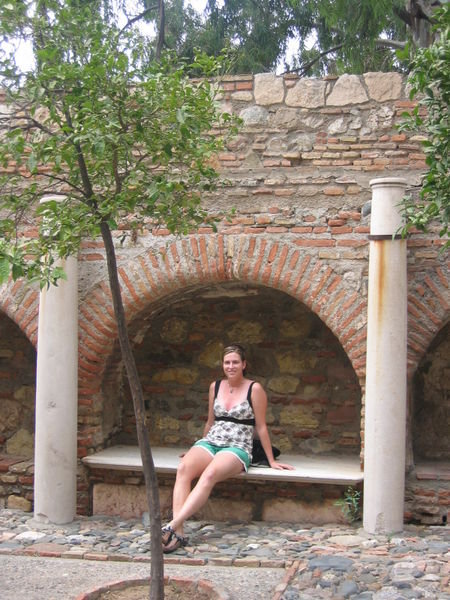 Me at roman baths in Malaga, Spain