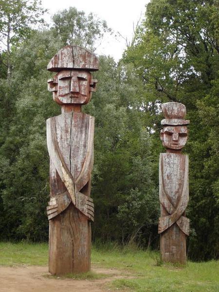 wooden moai tyoe sculptures