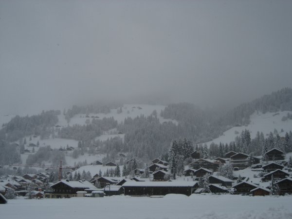 snow covered swiss chalets