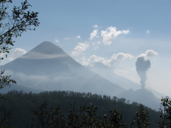 Volcan Santa Maria next to Volcan Santiaguito erupting