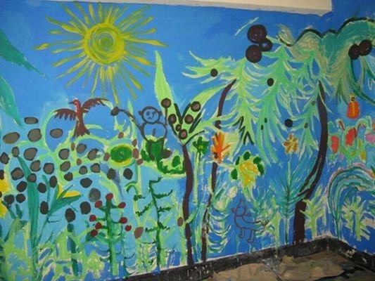 Mural on wall of new library at El Nahual
