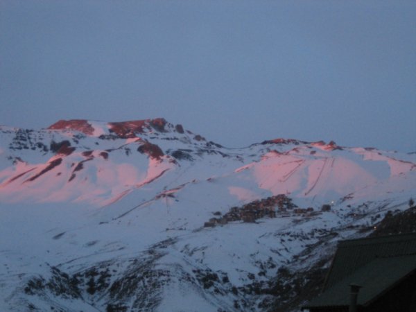 Sunset reflected off the slopes of La Parva