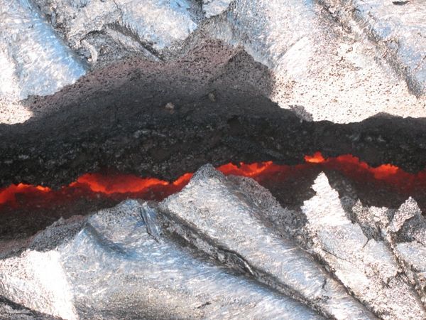 Red Lava inside cracks