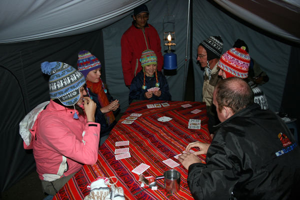 tim, sas and rachel playing cards in camp no. 3