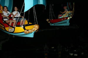 Girls flying in the Peter Pan ride
