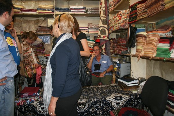 7. Tim loves scarf shopping in Aleppo souk
