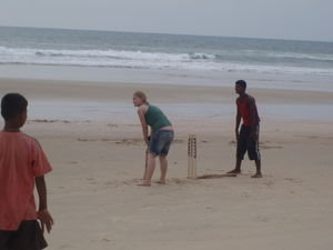 Becs S playing cricket with local boys