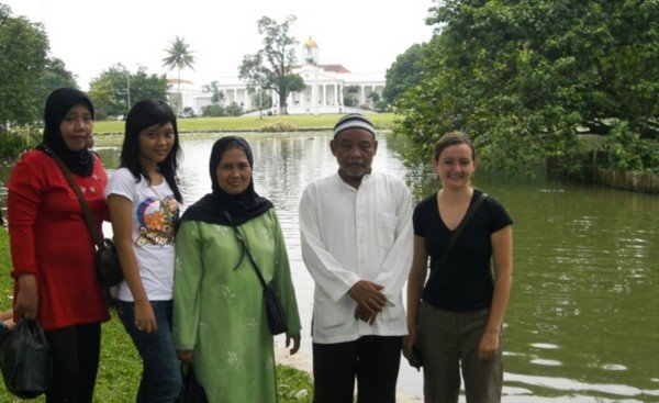 in front of the lake and palace in Bogor gardens