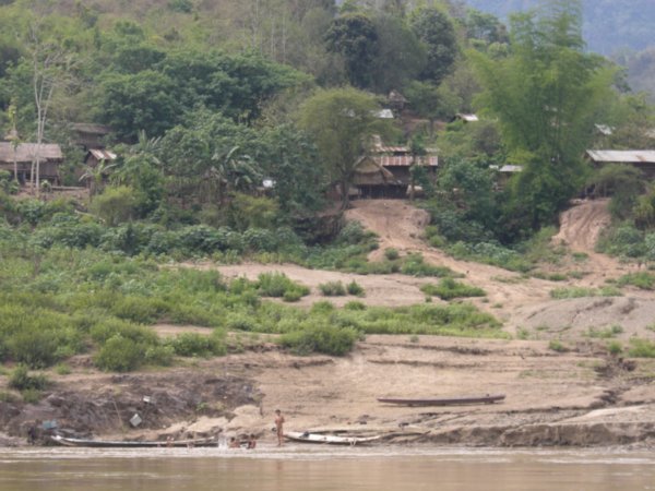 one of the many villages we passed along the Mekong