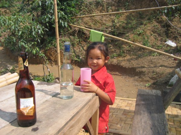 Little girl serving alchohol