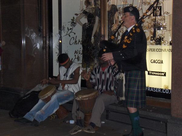 Bagpiper with Jamaican Accompaniment