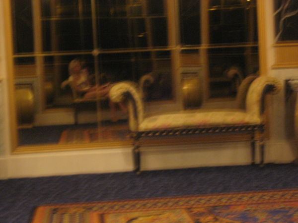 Me at rest in a Paris hallway