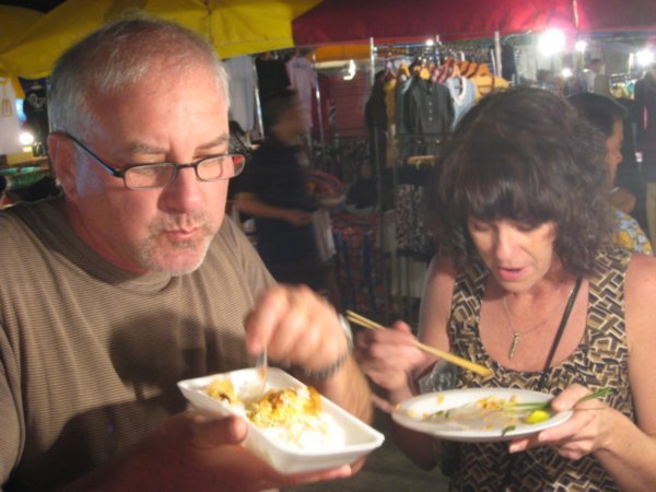 Mom and Dad chowin down on street food