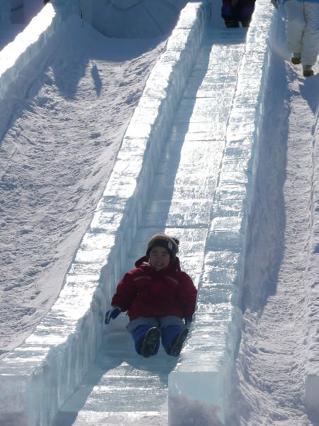 cute kiddy on an ice slide!