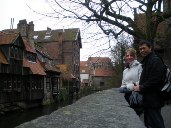 Standing next to a canal in Bruges