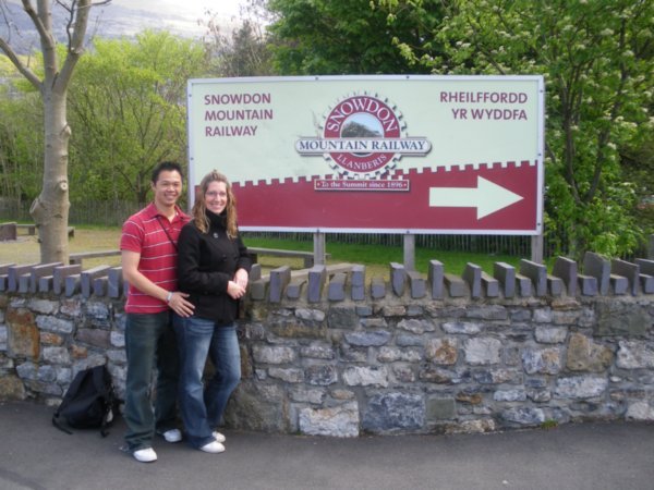 Us in front of Railway sign