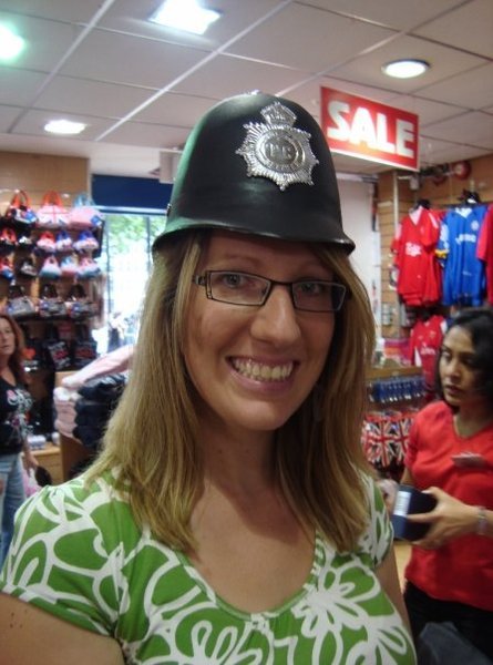 Bri in police Bobby hat