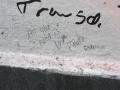 Bri signs the graffiti wall at Abbey Road