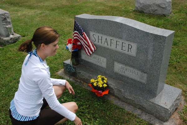Placing Flowers at Grandpa's Grave