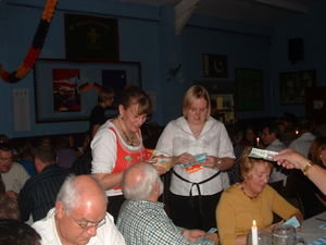 Raffle tickets being sold by our multi-talented waitresses