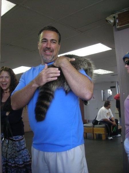 haha uncle mo pretending that the racoon fur is a pet...lol
