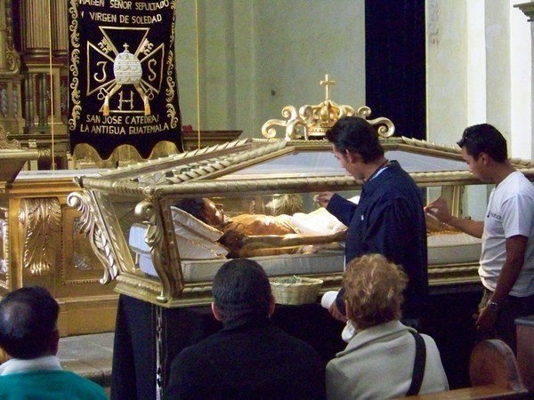 The crucified Christ in a glass coffin