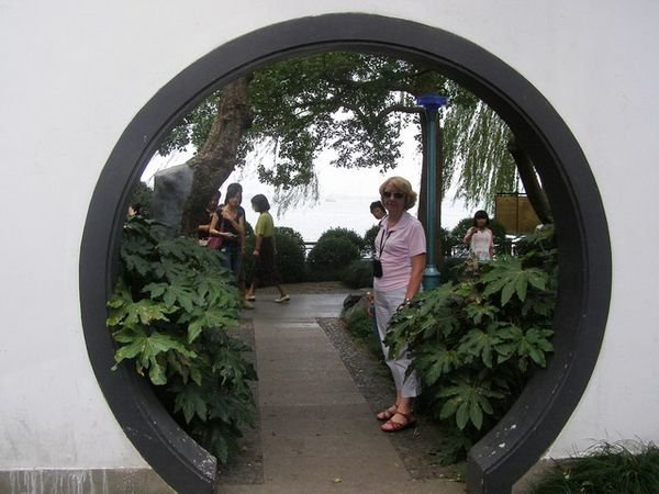 Through a circular doorway towards the lake