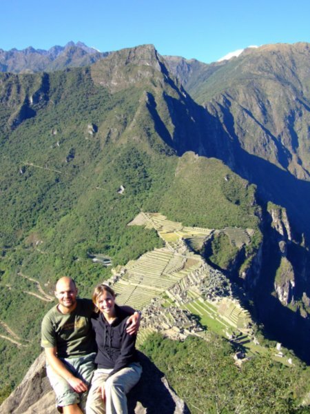 The perfect seat on top of Wayna Picchu with Machu Picchu behind