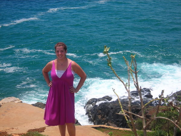 posing precariously close to the edge of the cliff