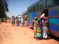 our bus, swarmed with women and children selling fruits, breads, roots, and drinks