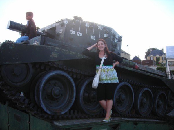 posing with a tank in bénouville