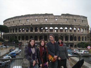 the whole gang in front of the Colosseum