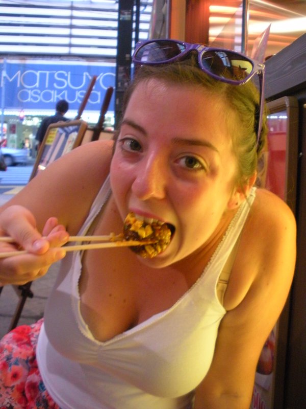 a very attractive shot of me shoving takoyaki in my mouth