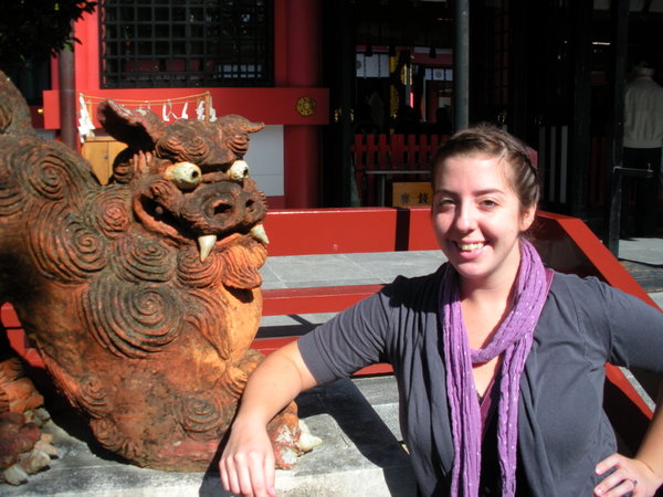 me with a crazy-eyed shisa statue in Naha