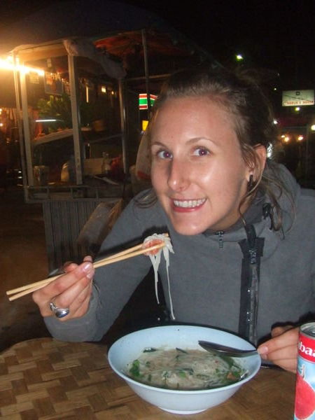 Jem eating Noddle soup at a street stall