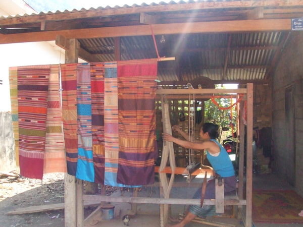 Local Lady weaving on her Loom - Vang Vieng, Laos