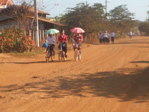 Girls on their way home from school - Don Det, Laos