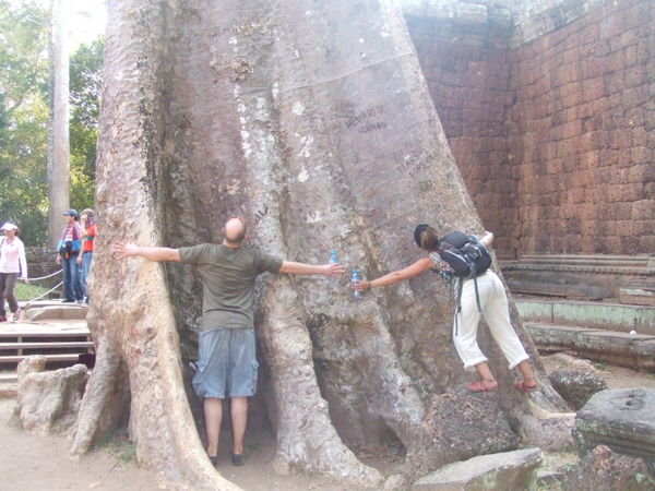 Jem and our friend Paul - Gigantic tree at a Wat