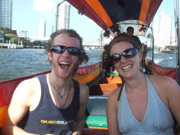 Clare and Sam, boat trip in Bangkok - windy!