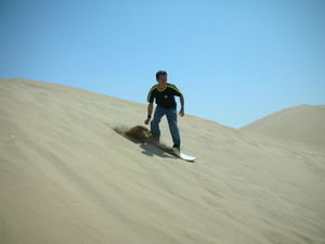 Sand surfing in Huacachina