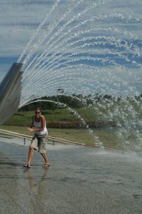 Claire under fountain at Olympic Park