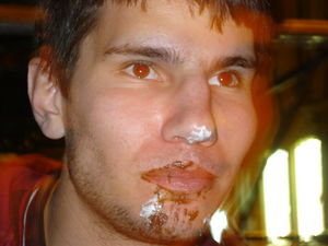Waffle all over Ben's face!  Yay nutella and whipped cream!